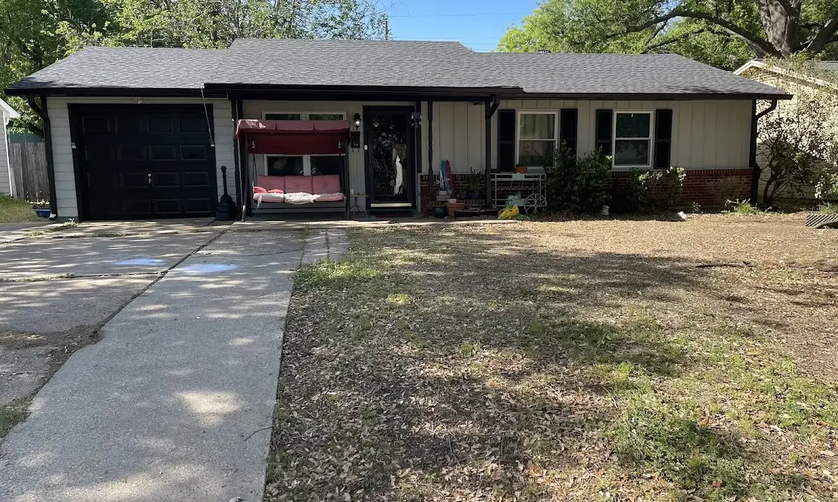 Roof Replacement crew at work on a residential roof in Natchez